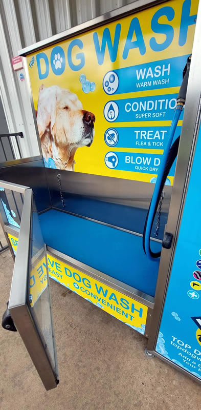 Entry door and branded wash station at Top Dog Wash